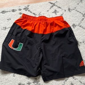 Orange and black miami adidas shorts